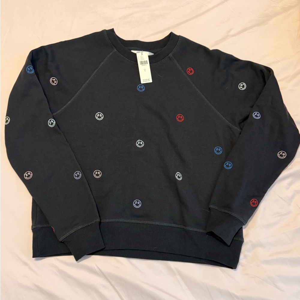 This is a Spiritual Gangster All Smiles Forever Cozy Crew sweatshirt